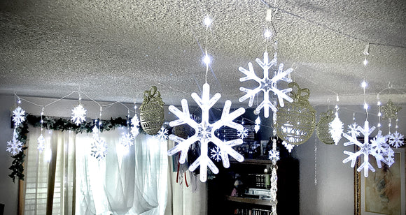 Overhead snow flake decorations for the home.